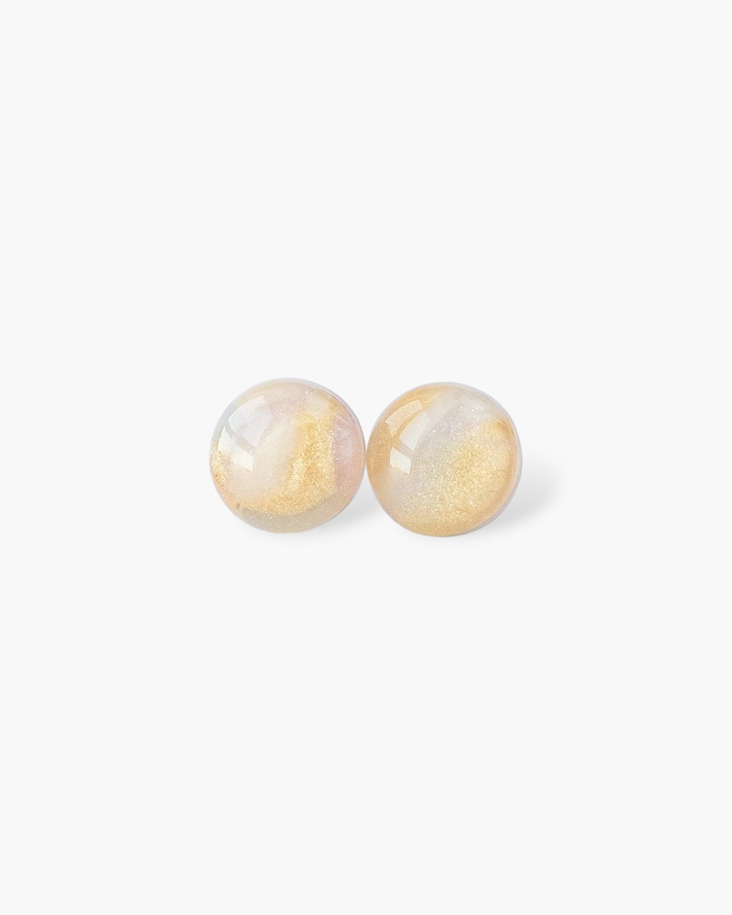 Delicate pearl stud earrings