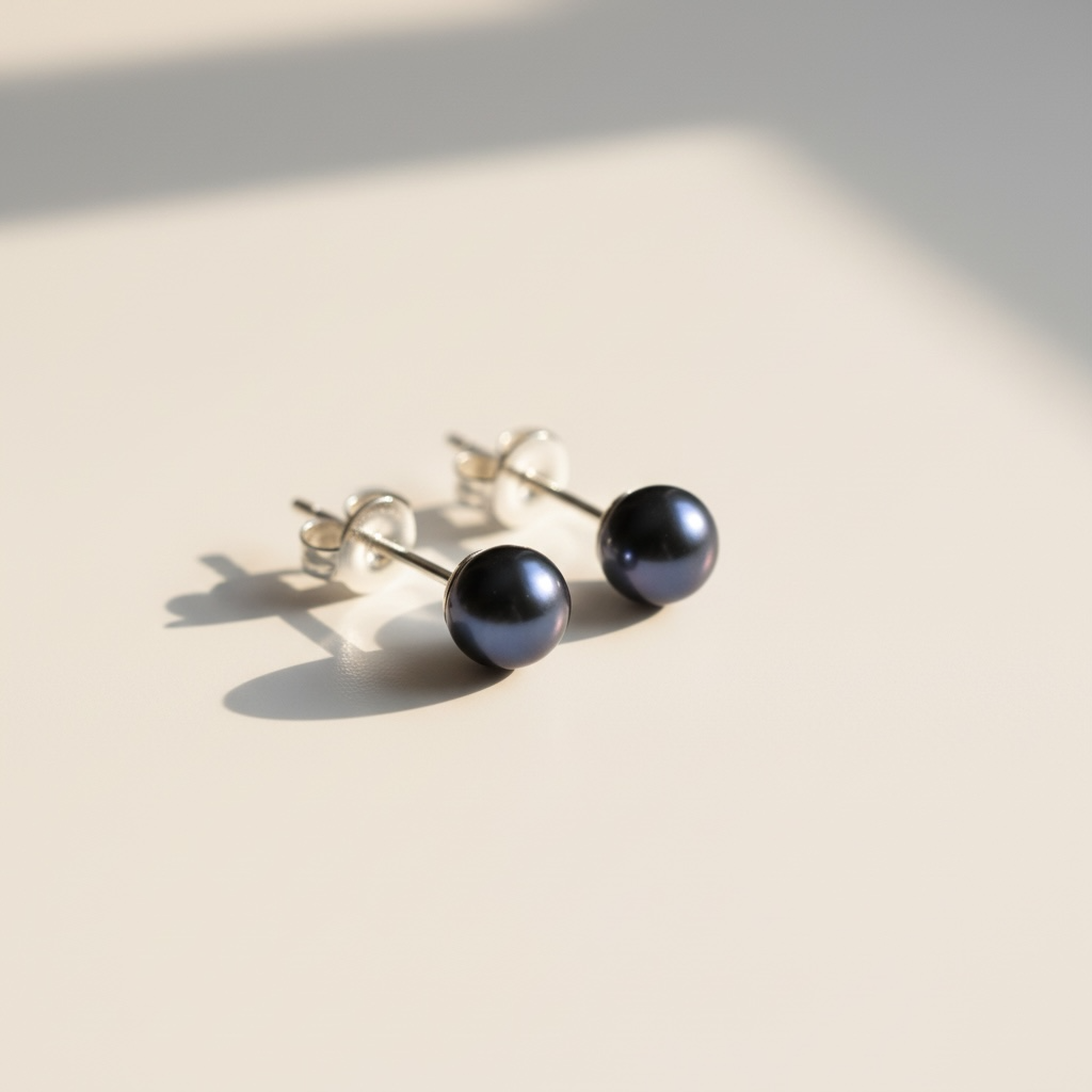Dark grey smokey pearl earrings silver studs