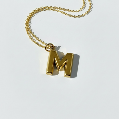 Gold initial M pendant necklace on a minimalist chain, handmade jewelry