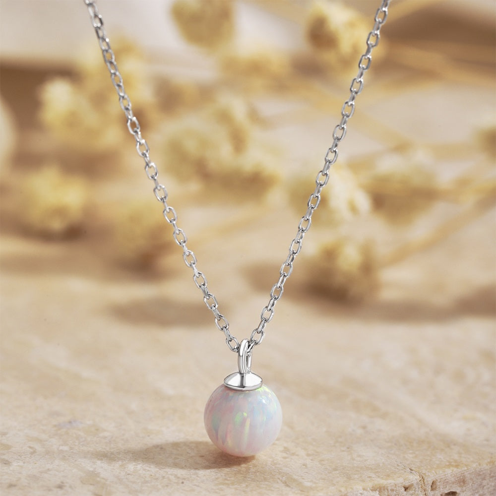 Opal pendant necklace on a delicate sliver chain