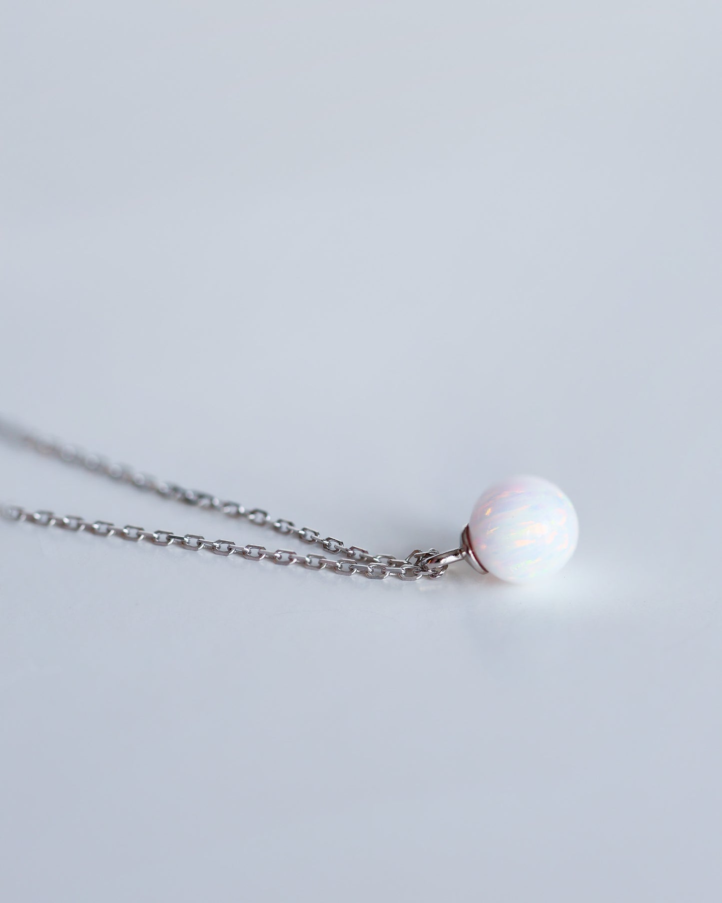 Opal pendant necklace on a delicate sliver chain