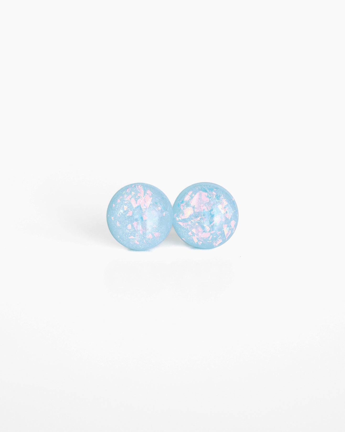 Sky blue sparkly stud earrings with surgical steel posts