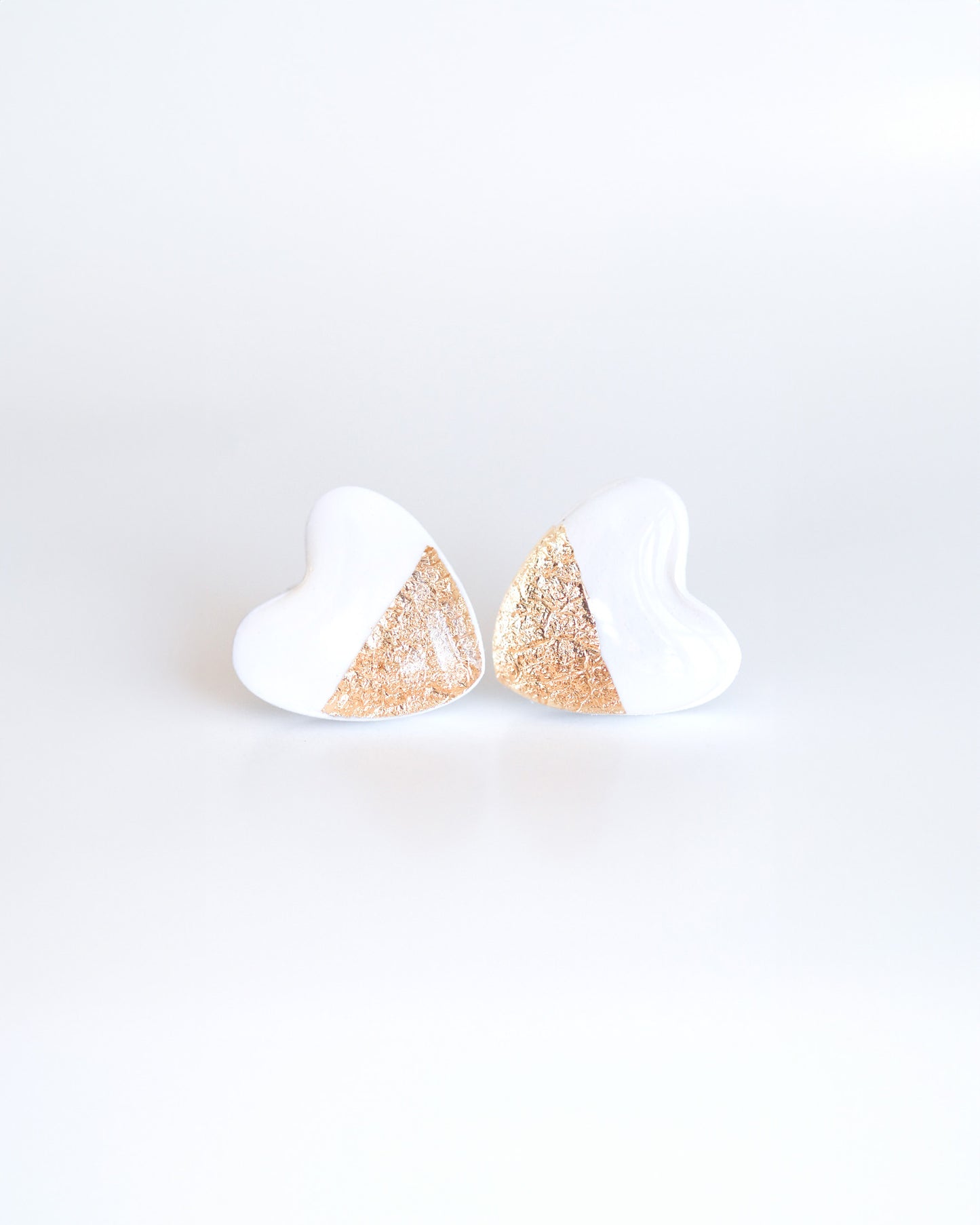 White heart stud earrings with gold foil