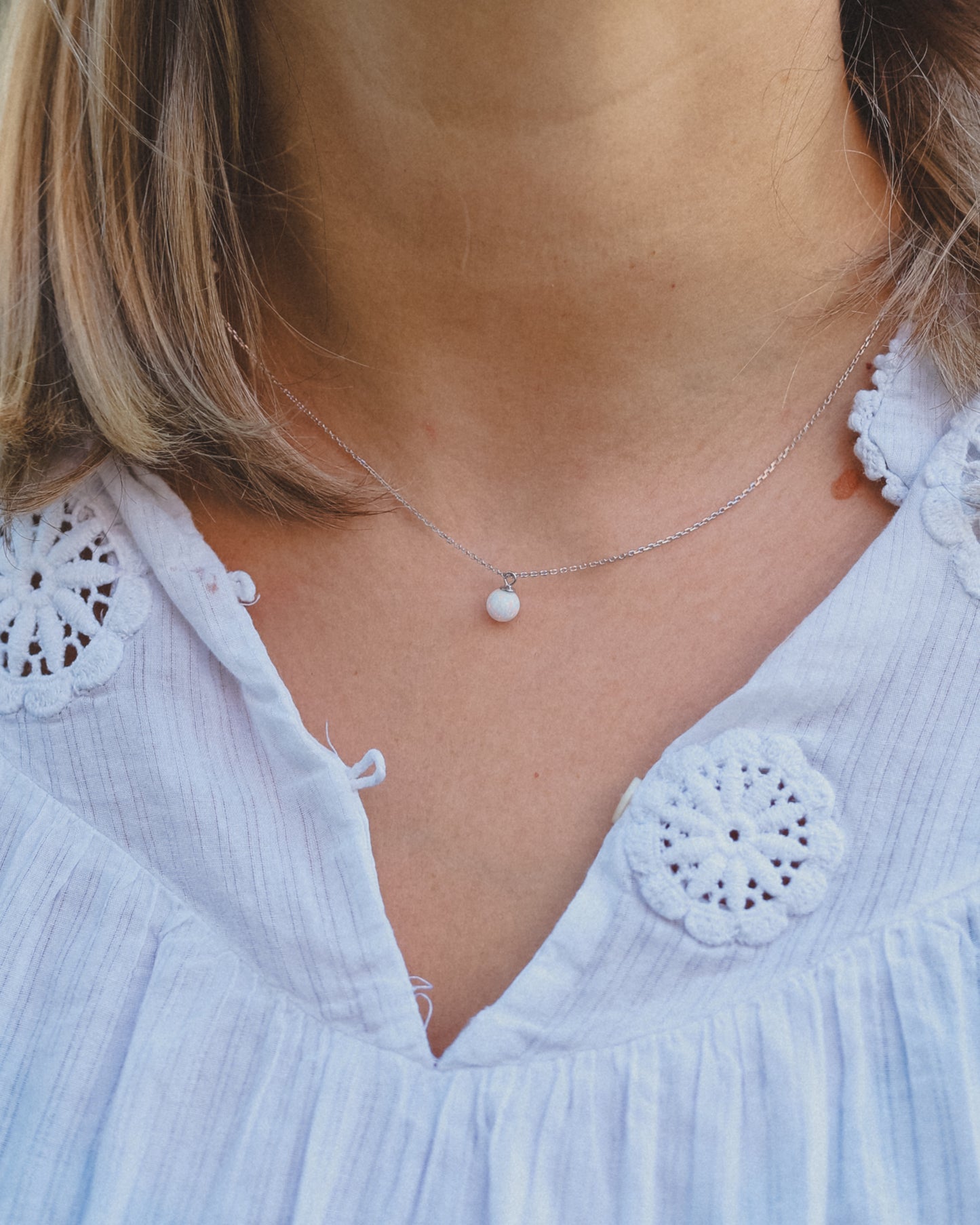 Opal pendant necklace on a delicate sliver chain