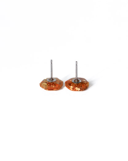 Delicate golden hexagon stud earrings with surgical hypoallergenic posts