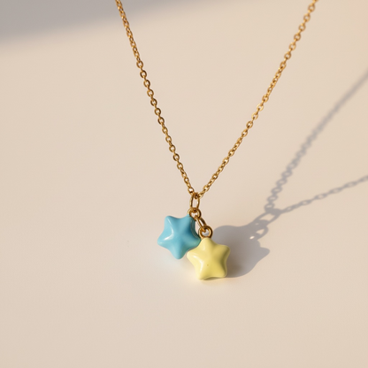 Gold chain necklace with blue and yellow star charms, minimalist handmade jewelry