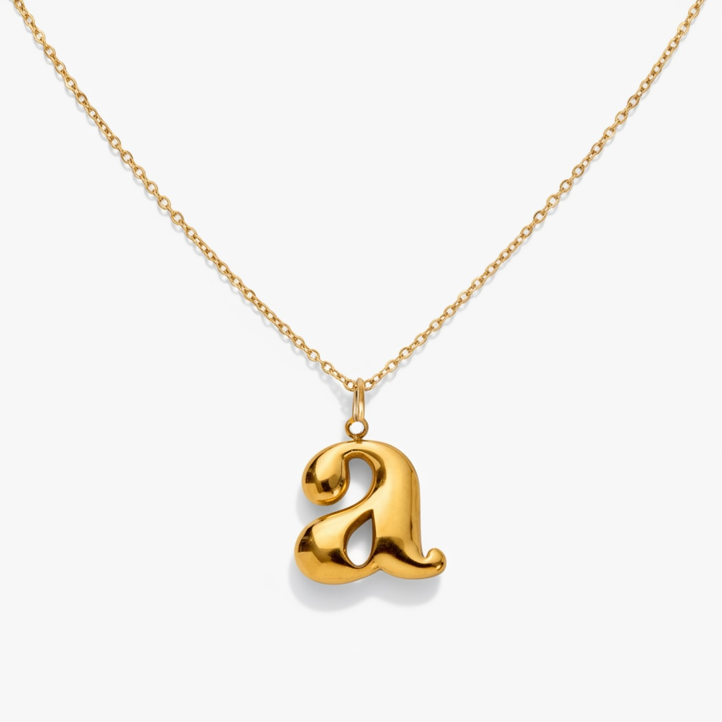 Gold necklace with a lowercase letter a charm pendant on a white background