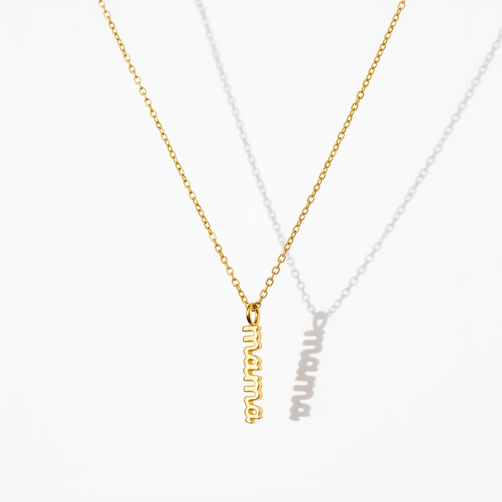 Gold necklace with vertical mama pendant on white background, minimalist jewelry