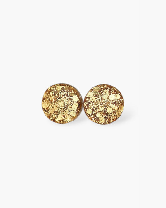 Gold round stud earrings on a white background