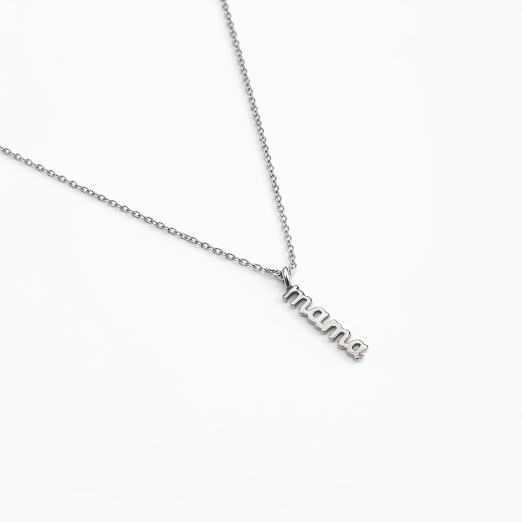 Minimalist silver necklace with 'mama' pendant on white background