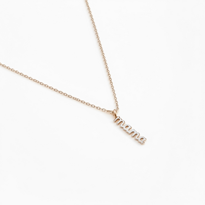 Gold minimalist mama necklace with delicate chain on white background