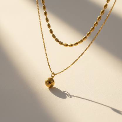 Elegant Layered Bead and Ball Pendant Necklace in Stainless Steel
