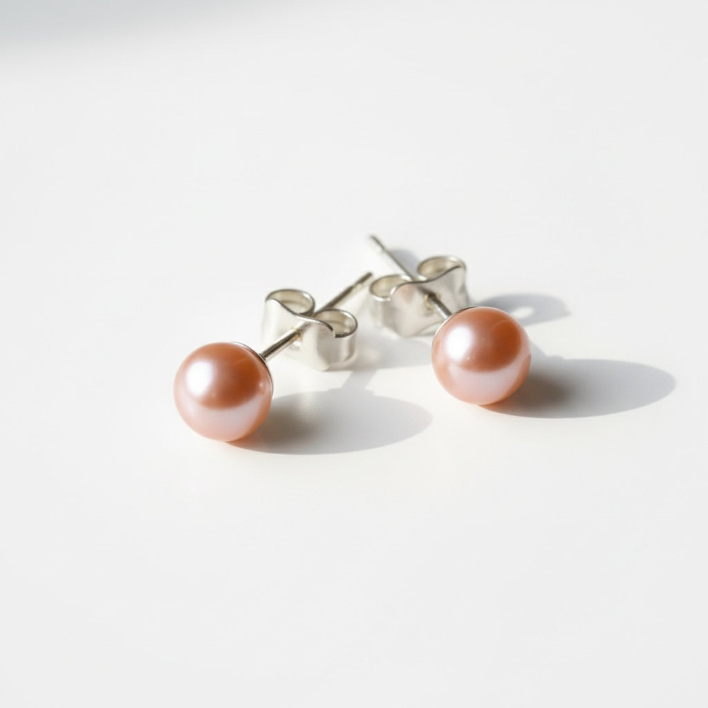 Boucles d'oreilles clous rose nacré avec tiges en argent