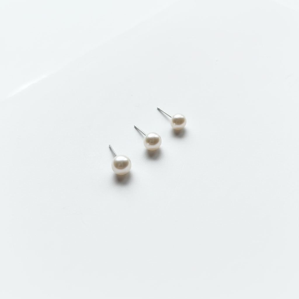 Boucles d'oreilles clous en véritables perles avec tiges en argent