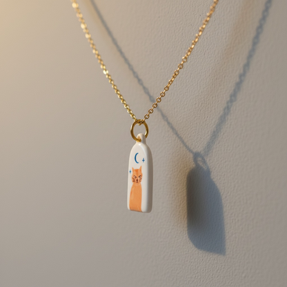Collier en acier inoxydable avec pendentif chat orange
