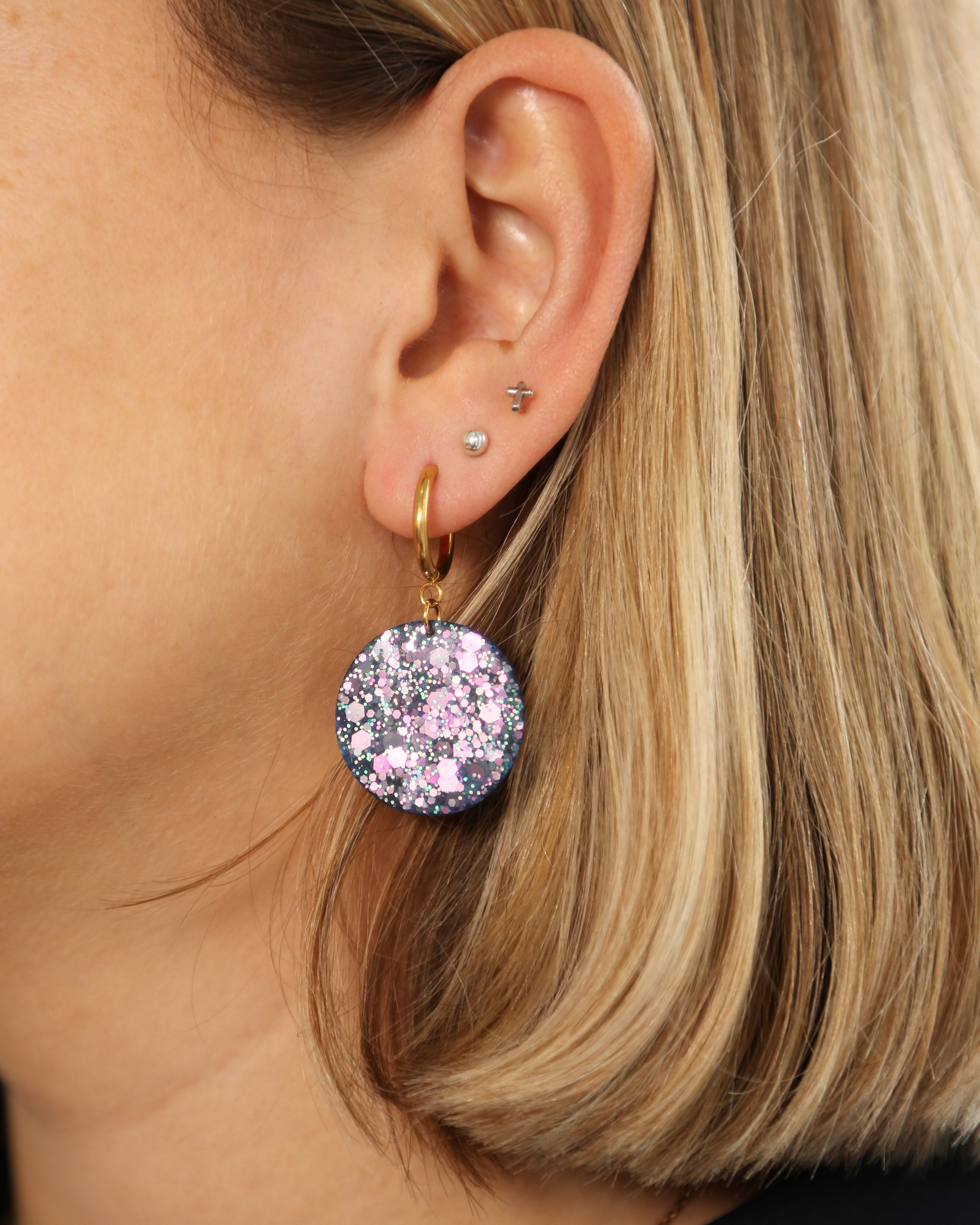 Delicate fashion statement earrings made from crystal resin
