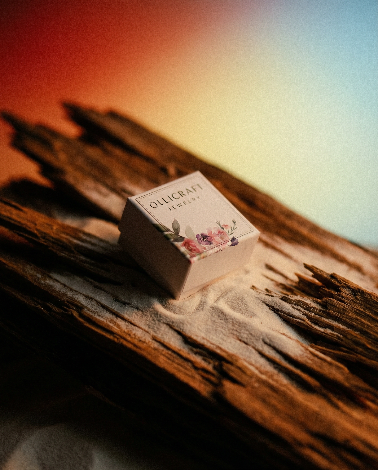 Floral jewelry box with watercolor flowers on rustic wood, soft gradient background