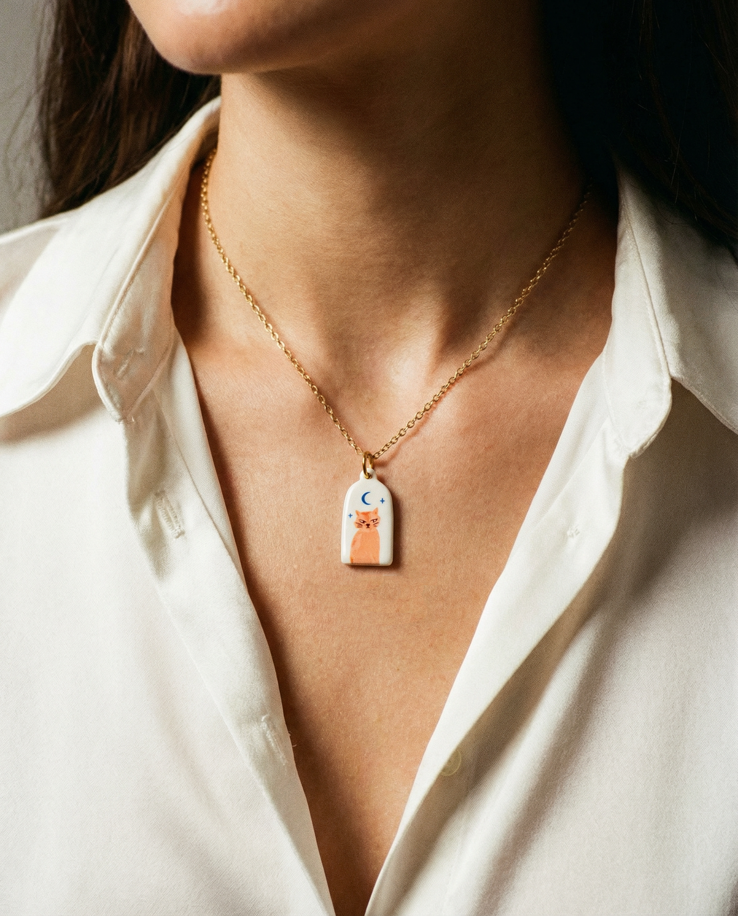 Collier en acier inoxydable avec pendentif chat orange