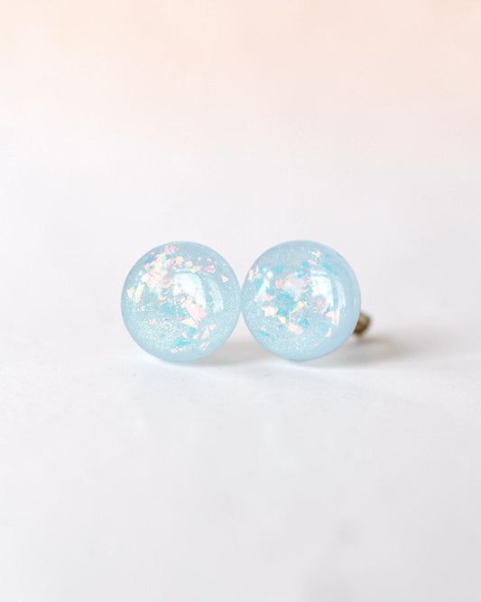 Sky blue sparkly stud earrings with surgical steel posts