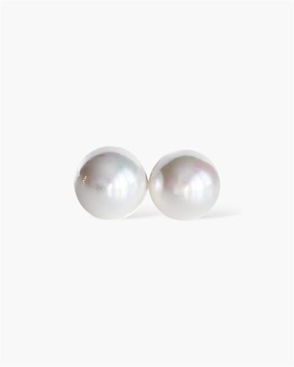 Pair of pearl earrings on a white background