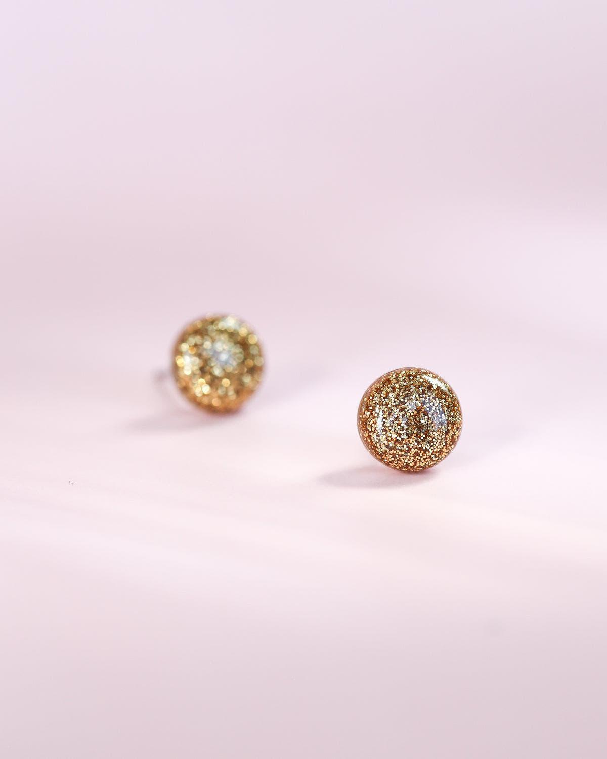 Golden sparkling studs earrings with surgical steel posts - Ollijewelry