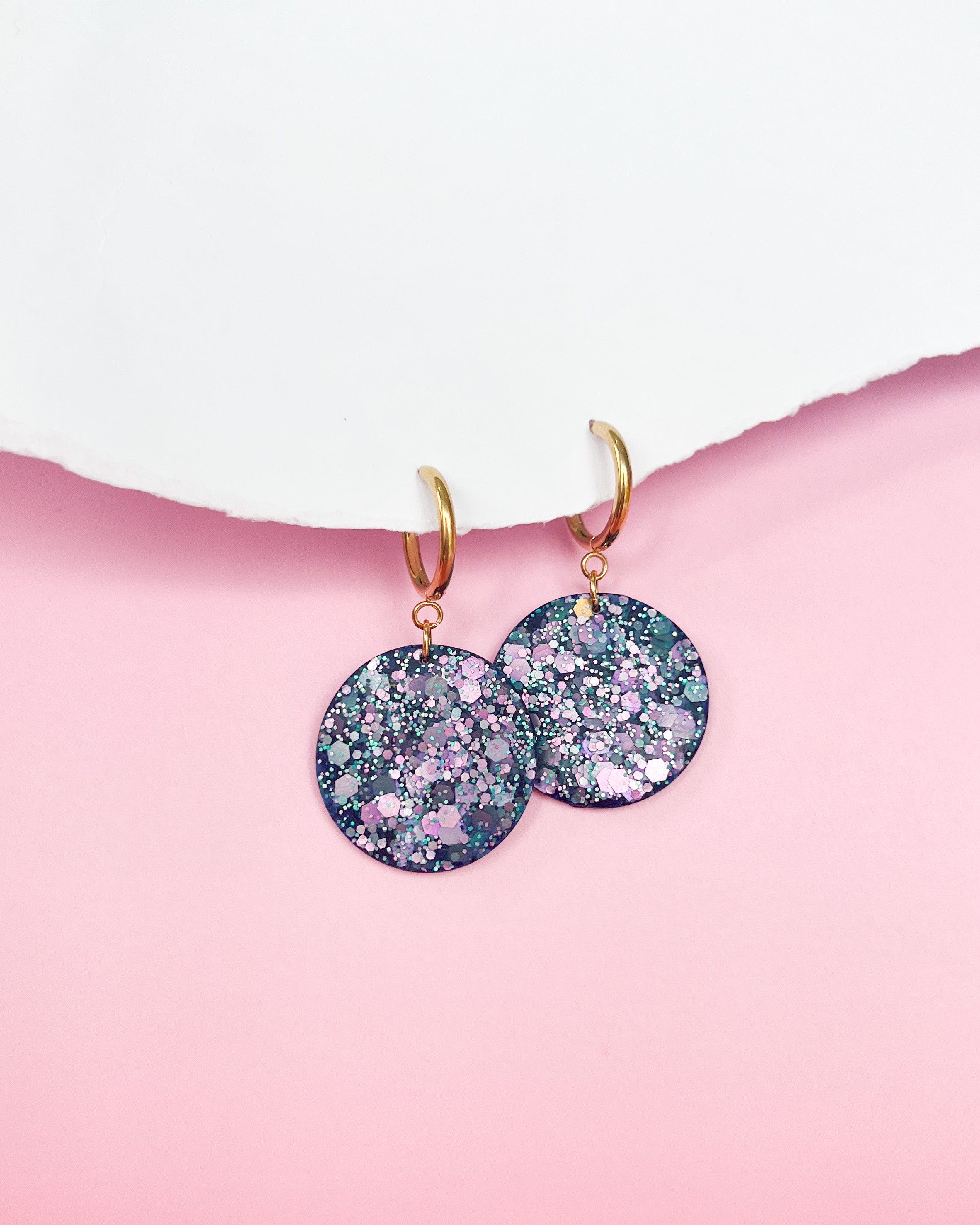 Delicate fashion statement earrings made from crystal resin
